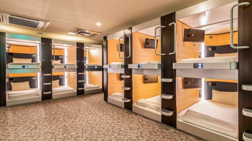 TheTwostoryBedroomAreaIsCombinedInsideAModernCapsule | Cadventura stay in Osaka